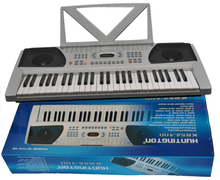 Load image into Gallery viewer, Huntington USA 54 Key portable electric keyboard with music rack and AC adaptor on blue box